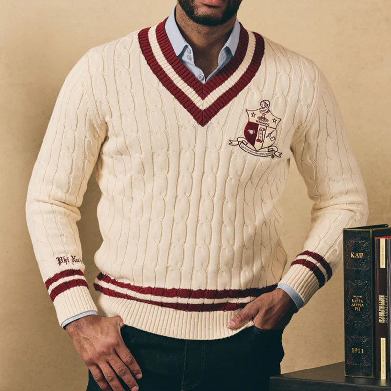 Young Man in cream cable knit sweater with maroon trim and “Kappa Alpha Psi" Logo embroidery