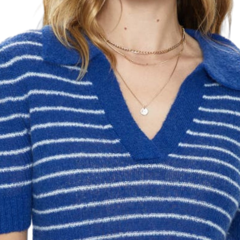 Close-up of a blue and white striped knit sweater showing the V-neck collar and soft fabric texture, highlighting the fine stitching and attention to detail.