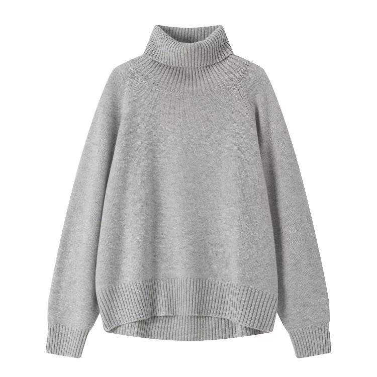 Women's grey turtleneck pullover with ribbed neckline, cuffs and hem, product view.