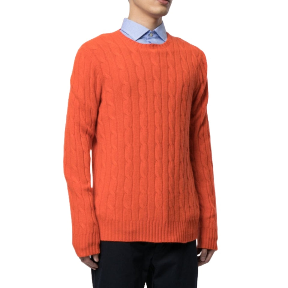 Man wearing orange wool blend crew neck sweater over a blue shirt