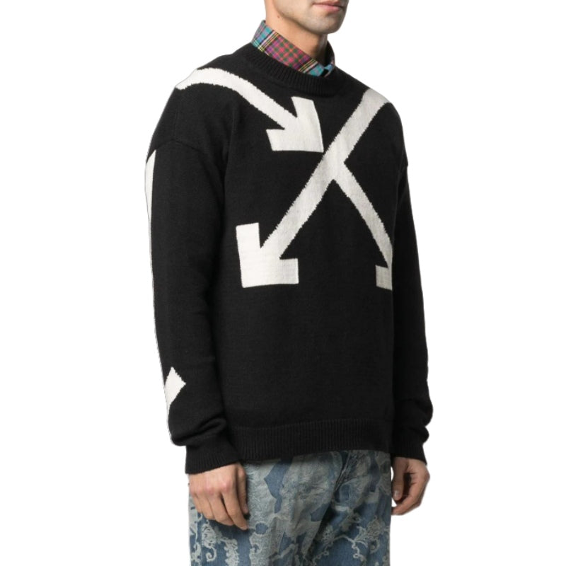 Man modeling a black and white custom jacquard crew neck sweater