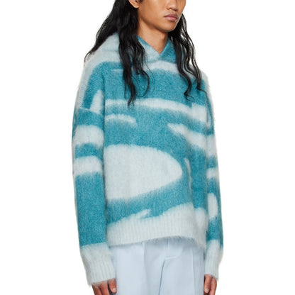 Side view of men's custom long sleeve mohair knitted sweater in blue and white.