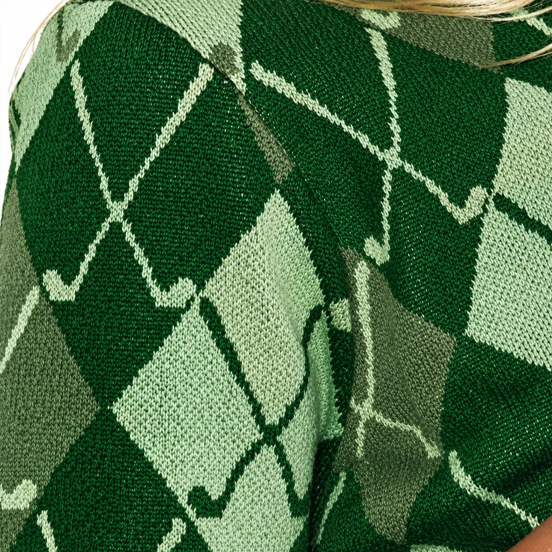 Close-up of the green and cream argyle pattern on knitted fabric