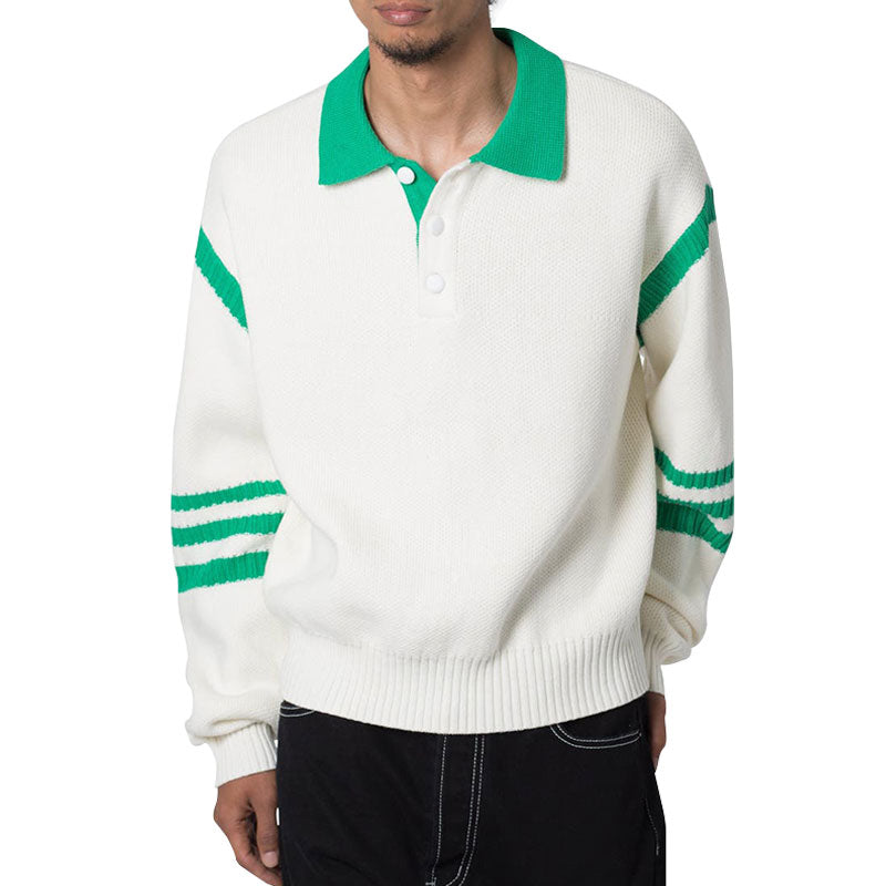 Man wearing a white 100% cotton pullover knit sweater with green color block design and polo collar, showcasing the front view. The sweater features green stripes on the sleeves and a button placket.