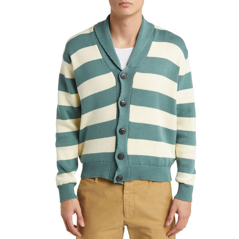 Front view of a model wearing a custom stripe cardigan with green and cream stripes, paired with a white t-shirt and khaki pants.