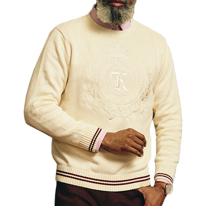 Man wearing a custom Greek embroidery sweater in cream with maroon embroidery "Kappa Alpha Psi" Logo