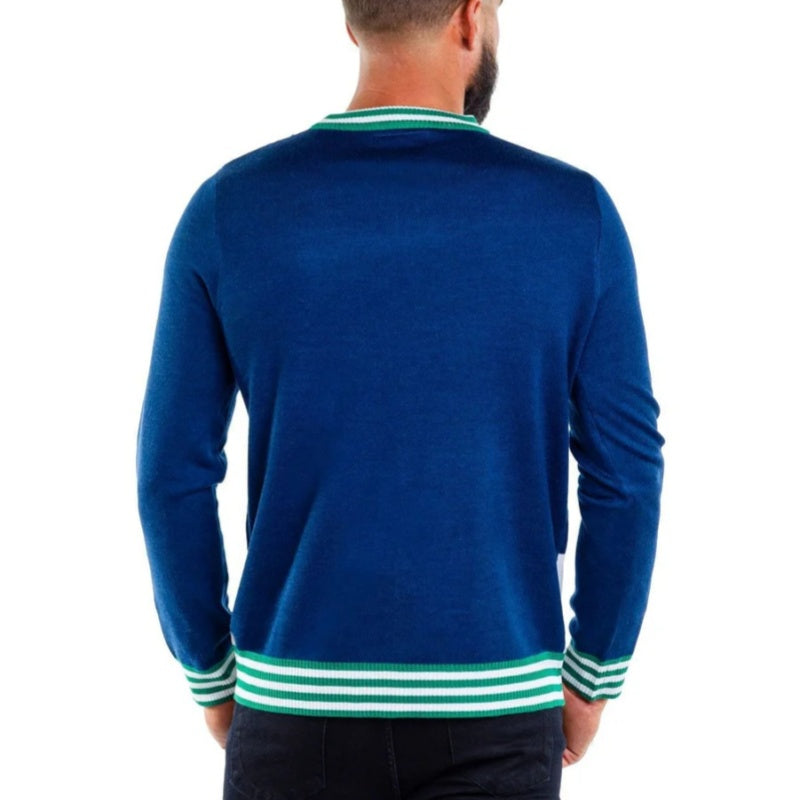 Back view of a custom Christmas knit sweater in solid blue with green and white striped accents on the collar, cuffs, and hem.