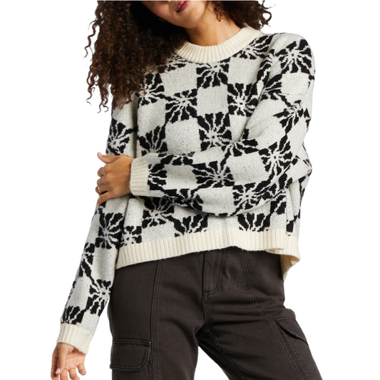 Front view of a custom wool blend pullover knit sweater featuring a black and white geometric jacquard pattern.