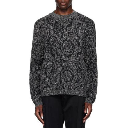 Custom jacquard floral knit sweater in black and gray, worn by a model, front view.