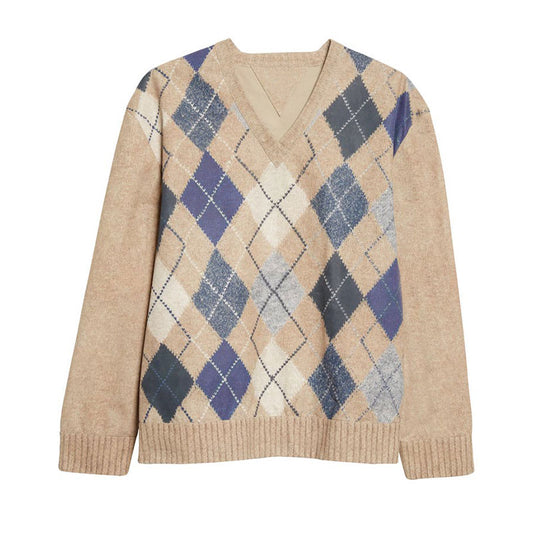 Flat lay of a beige and blue argyle sweater in a cashmere blend.