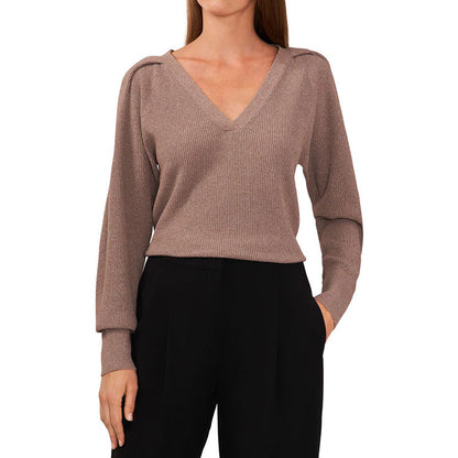 Front view of a custom V-neck ribbed knit sweater in a soft brown color, paired with black trousers, showing a sophisticated and polished look.