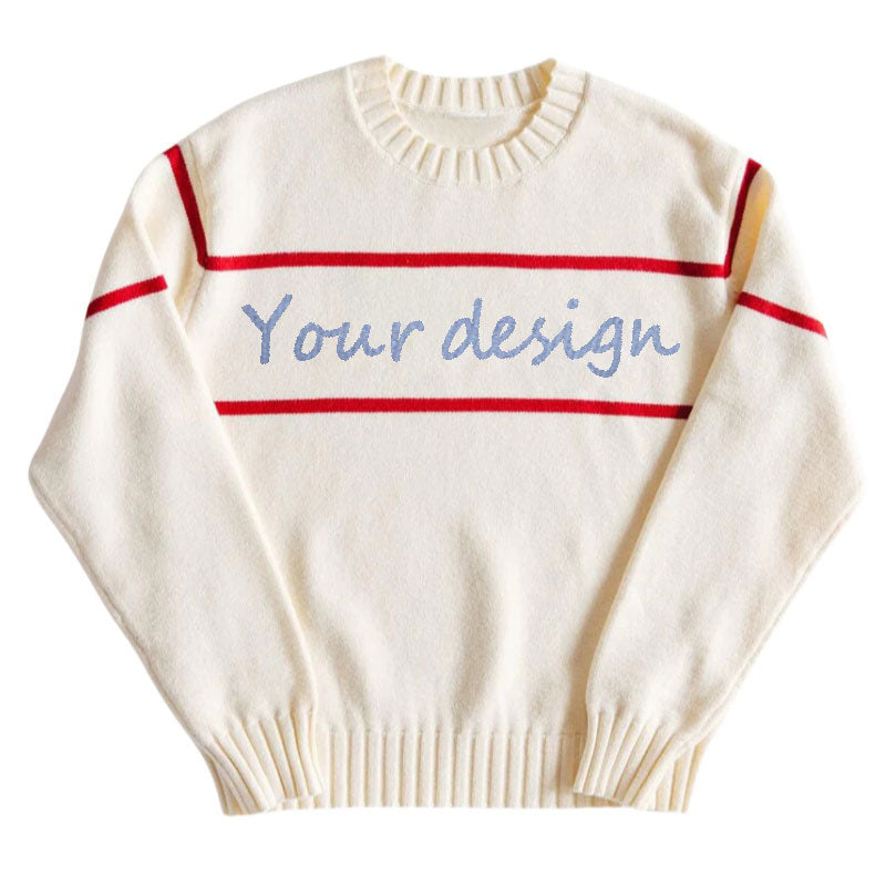 White knit sweater with red horizontal stripes and the text 'Your design' written in blue across the chest.