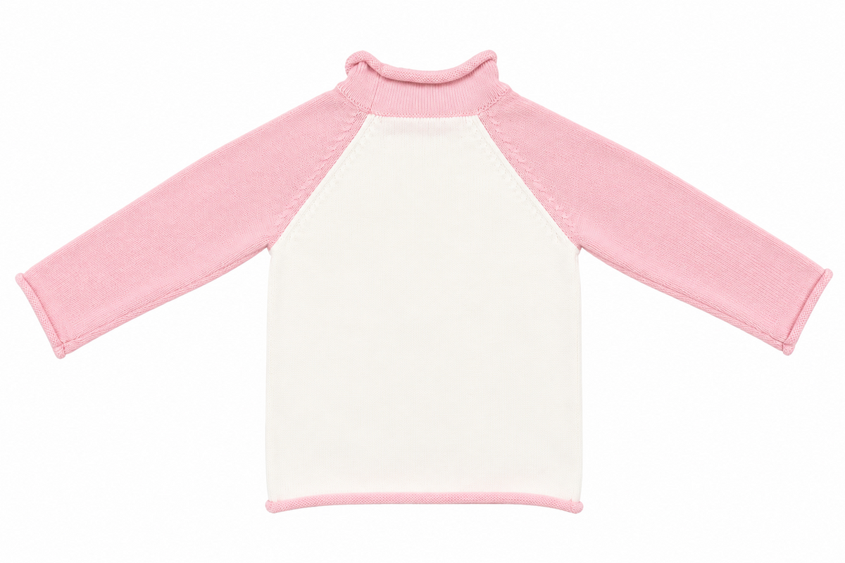 Ivory kids' knit pullover with pink contrast trim, back view.