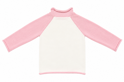 Ivory kids' knit pullover with pink contrast trim, back view.