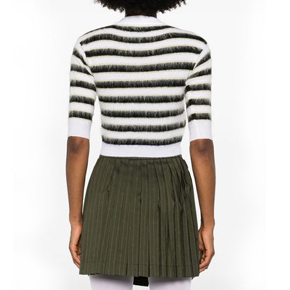 Back view of a black and white striped mohair wool blend women's knit sweater with half sleeves.