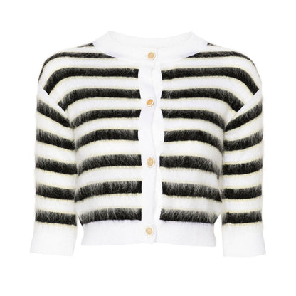 Front view of a black and white striped mohair wool blend women's knit sweater with button-down closure and half sleeves.