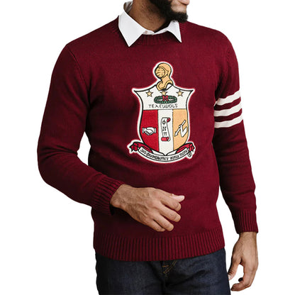 Custom maroon fraternity sweater with embroidered shield and three white stripes on the sleeve. Bulk manufacturing available for Greek organizations