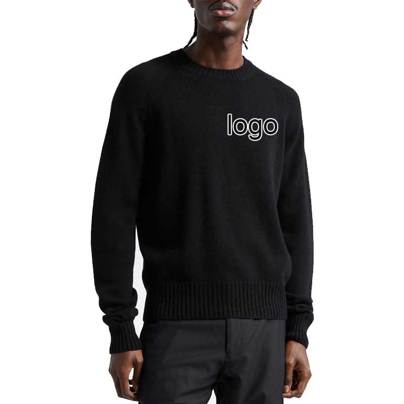 Model wearing a custom black knit sweater with logo, crafted from 100% cotton