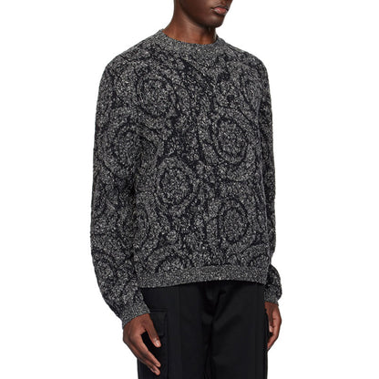 Custom jacquard floral knit sweater in black and gray, worn by a model, side view.