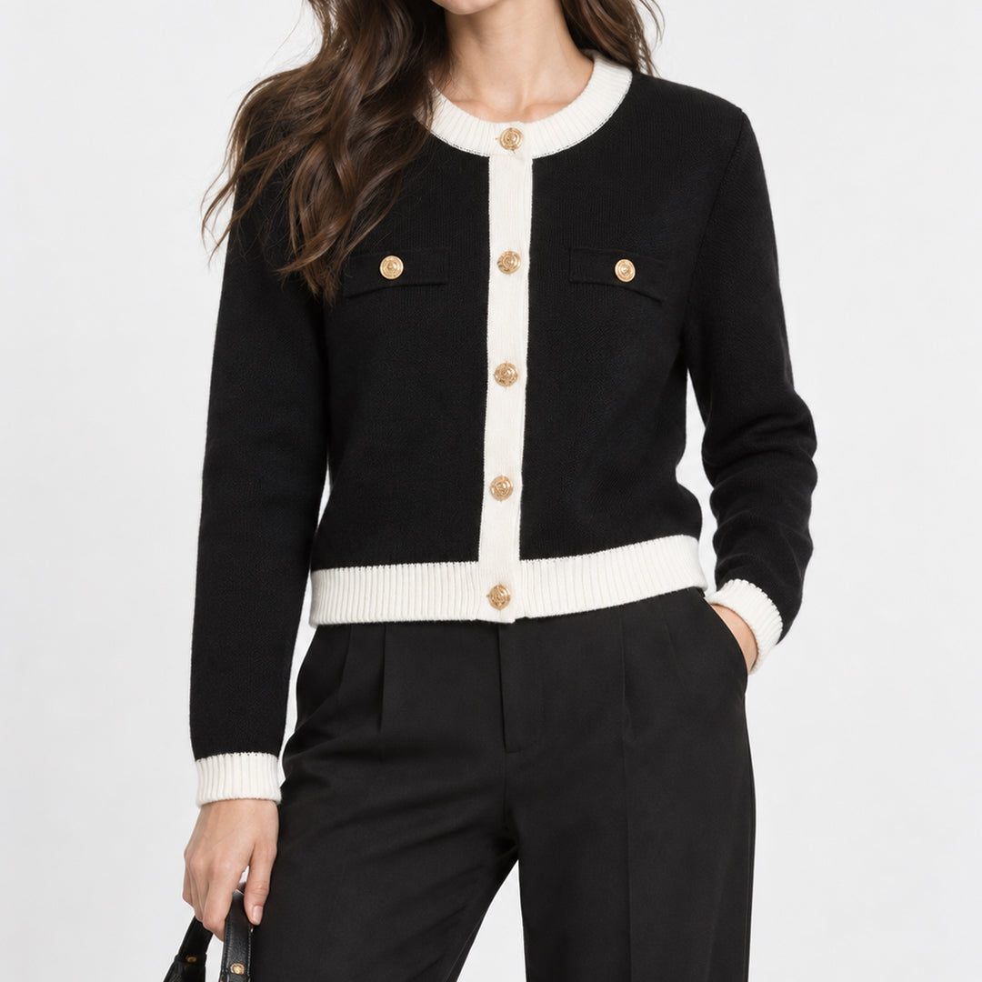 Black women's knit cardigan with cream contrast edging and button front