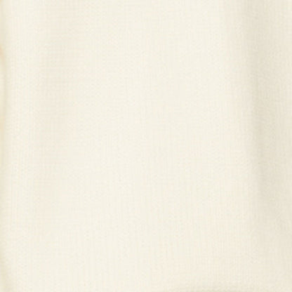 Close-up of the off-white cashmere knit sweater fabric, showcasing the soft and textured material quality.