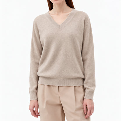 Beige women's V-neck pullover with ribbed cuffs