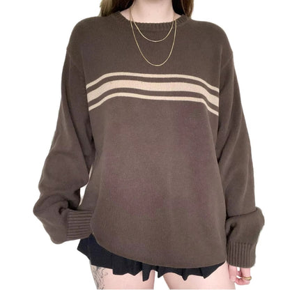 Front view of a relaxed-fit brown striped sweater with dropped shoulders.