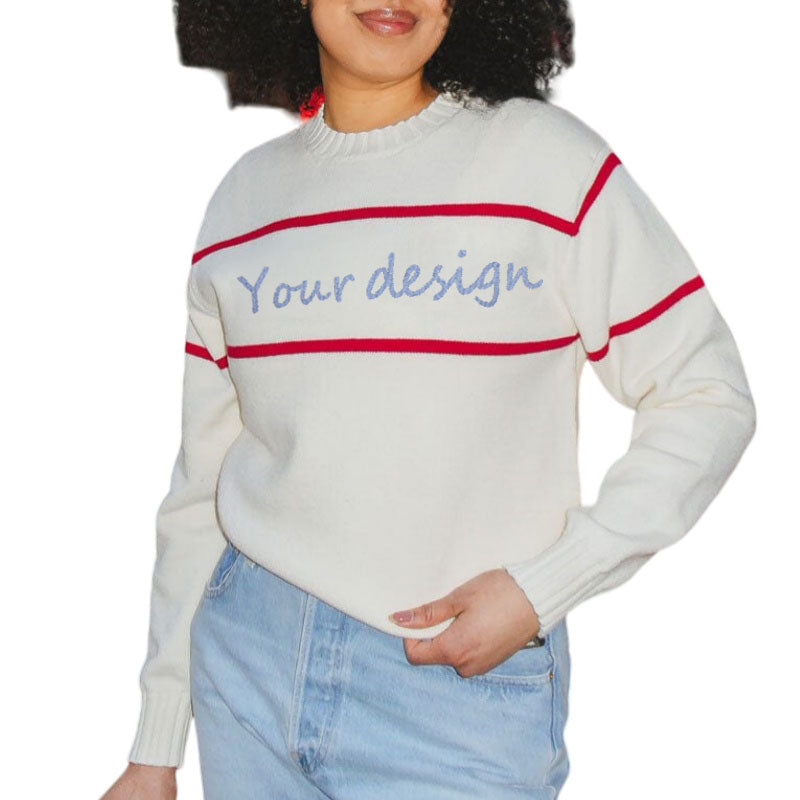 Woman wearing a white knit sweater with red horizontal stripes and the text 'Your design' written in blue across the chest.