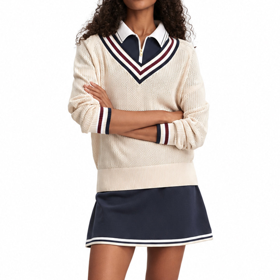 Front view of a women's cream preppy sweater with striped V-neck trim