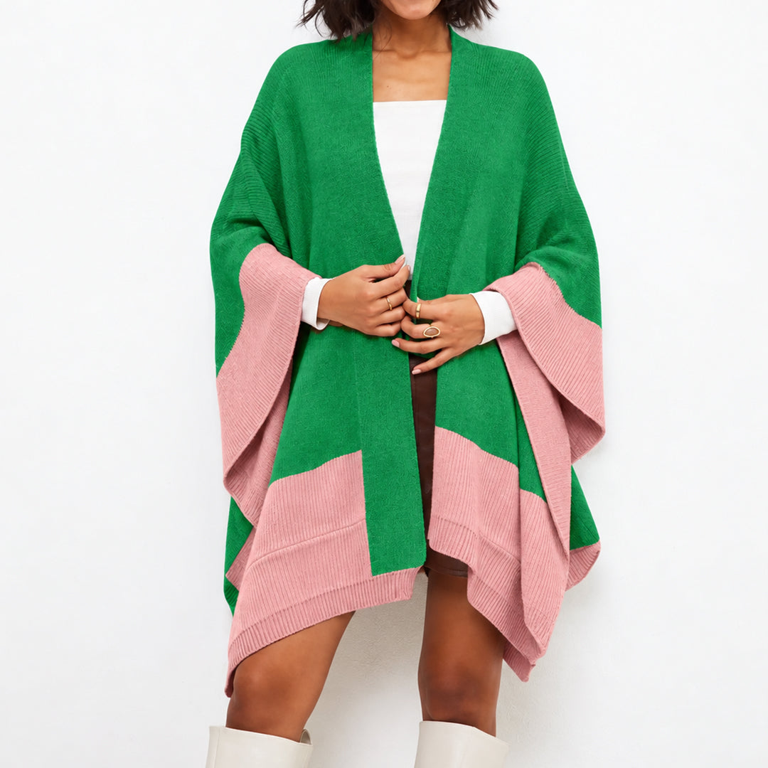 Front view of green color block knit poncho