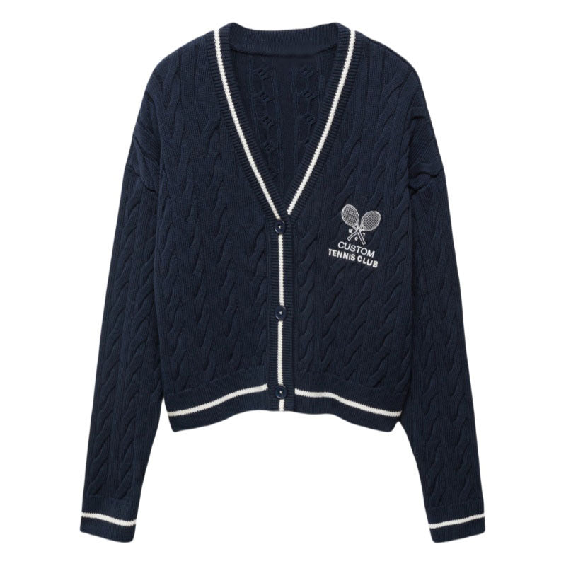 Front view of a dark blue cable knit cardigan with custom tennis club logo embroidered on the chest.