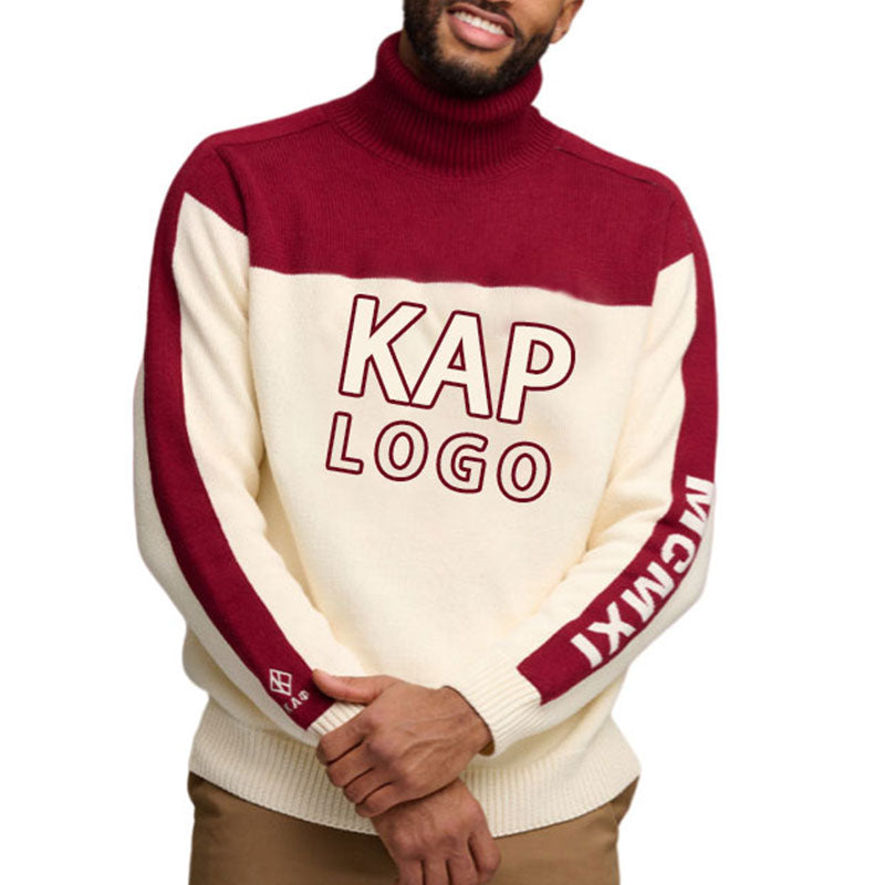 Man posing in a custom fraternity sweater featuring a red top and cream bottom, with 'KAP LOGO' prominently displayed on the front and 'MCIMXI' on the sleeve.