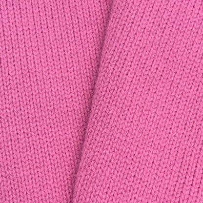 Close-up of soft pink knit fabric texture – soft material for custom cardigans