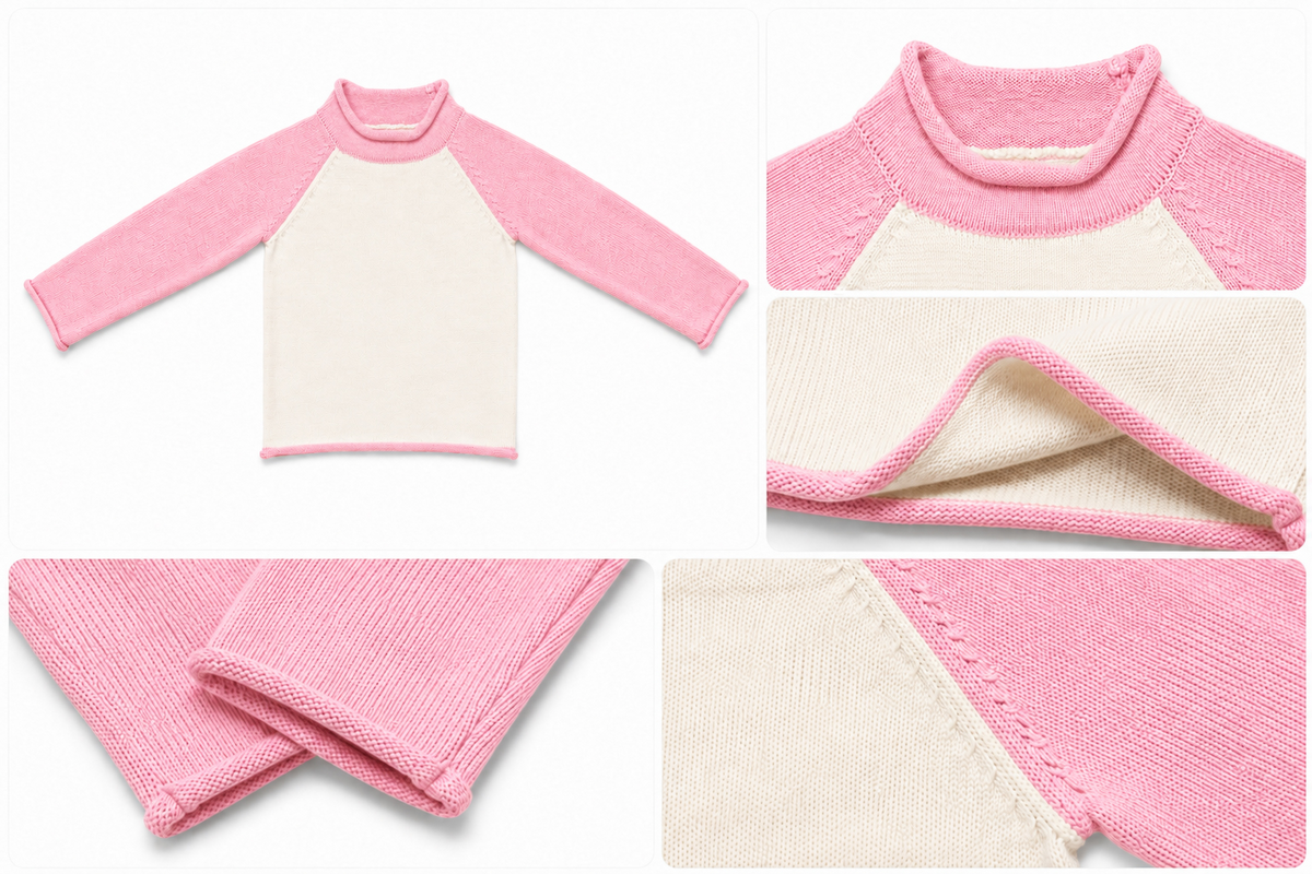Kids' ivory knit pullover with pink trim, showing neckline, cuffs and hem details.