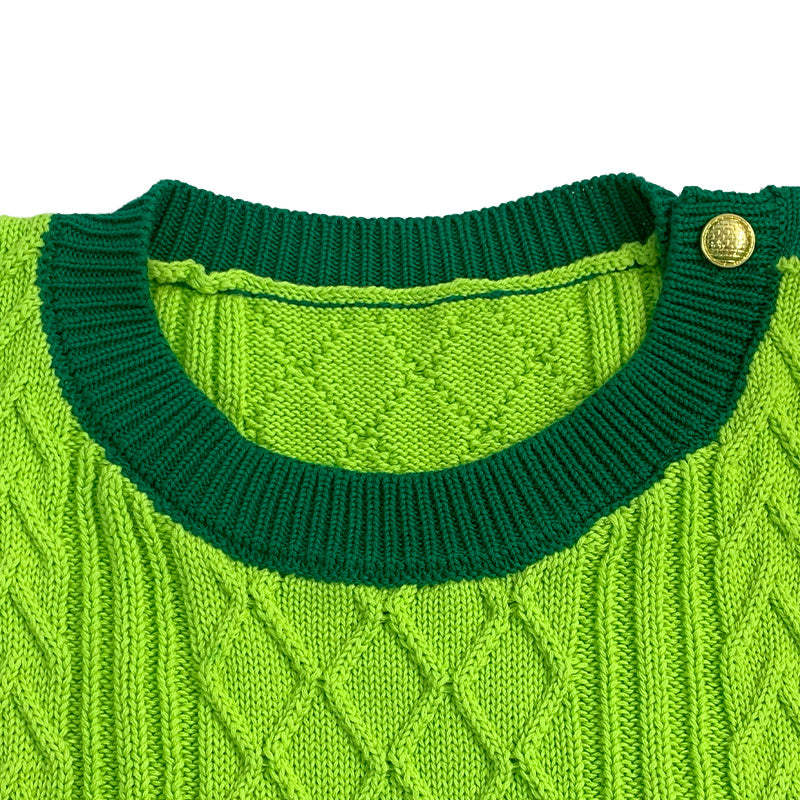 Detailed view of green sweater collar with gold button and diamond knit texture – ideal for Greek life customization.