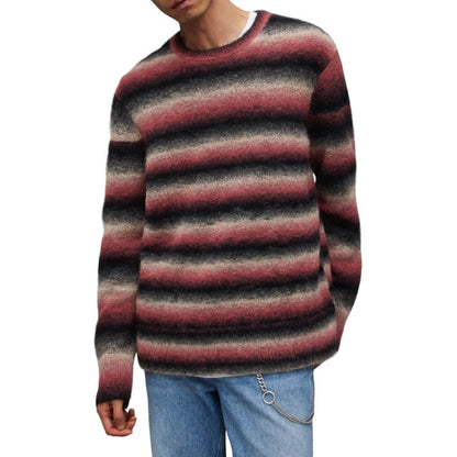 Male model wearing a custom red and grey striped mohair sweater, paired with blue jeans and a chain accessory. This pullover exemplifies our OEM/ODM knitwear manufacturing capabilities.