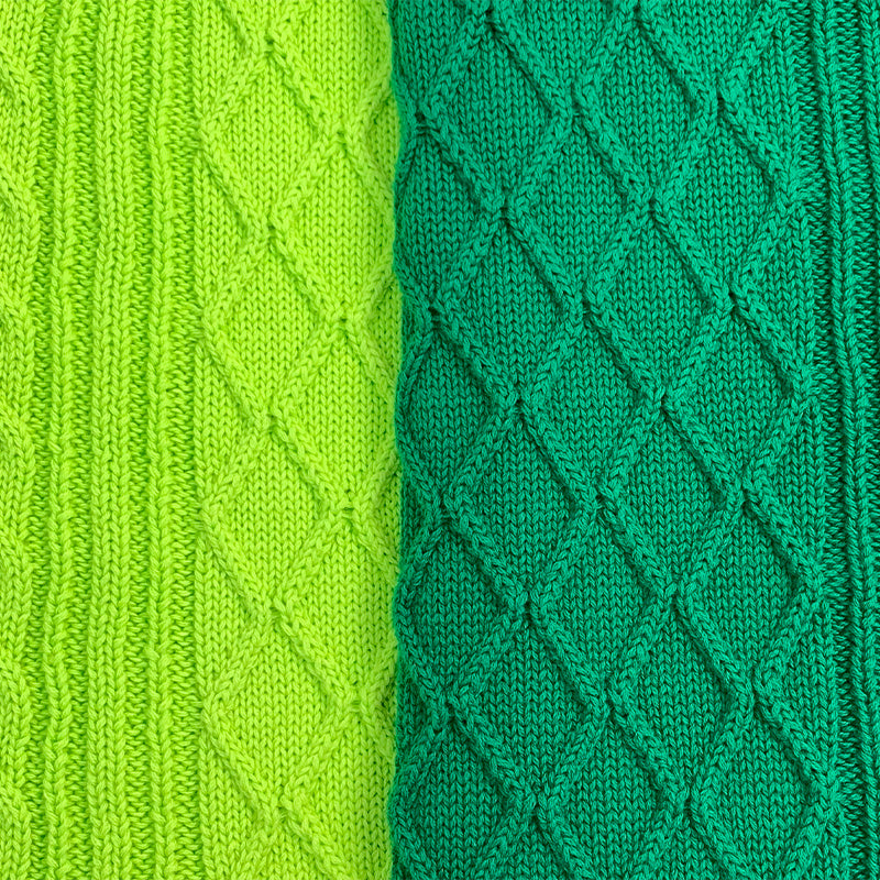 Side-by-side fabric comparison of light and dark green diamond knit patterns – customizable options from a sweater manufacturer.