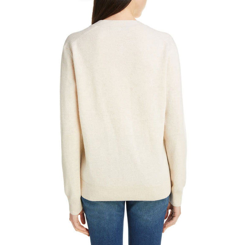 Back view of a beige V-neck cardigan sweater on a model - 100% cotton cardigan manufacturer.