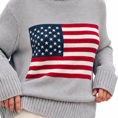 Close-up of American flag graphic on grey knit sweater