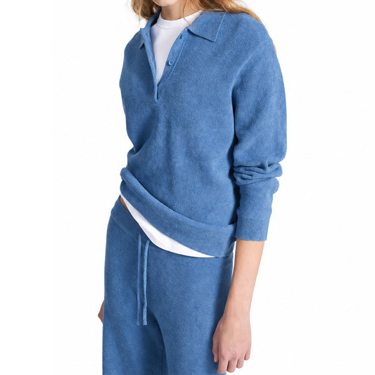 Side view of blue knit polo sweater
