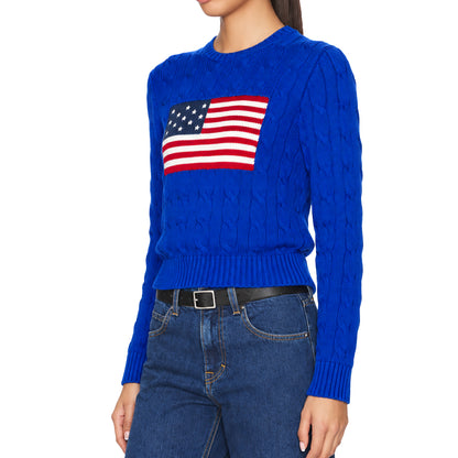 Side view of blue crew neck sweater with flag graphic