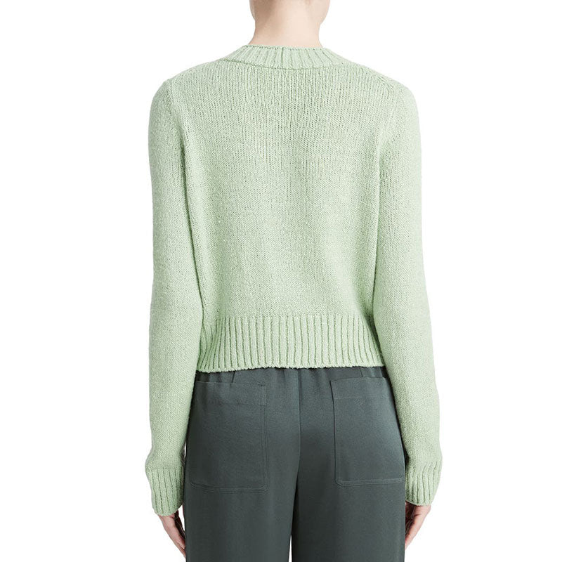 Back view of mint green cashmere blend pullover sweater showcasing the minimalist design.