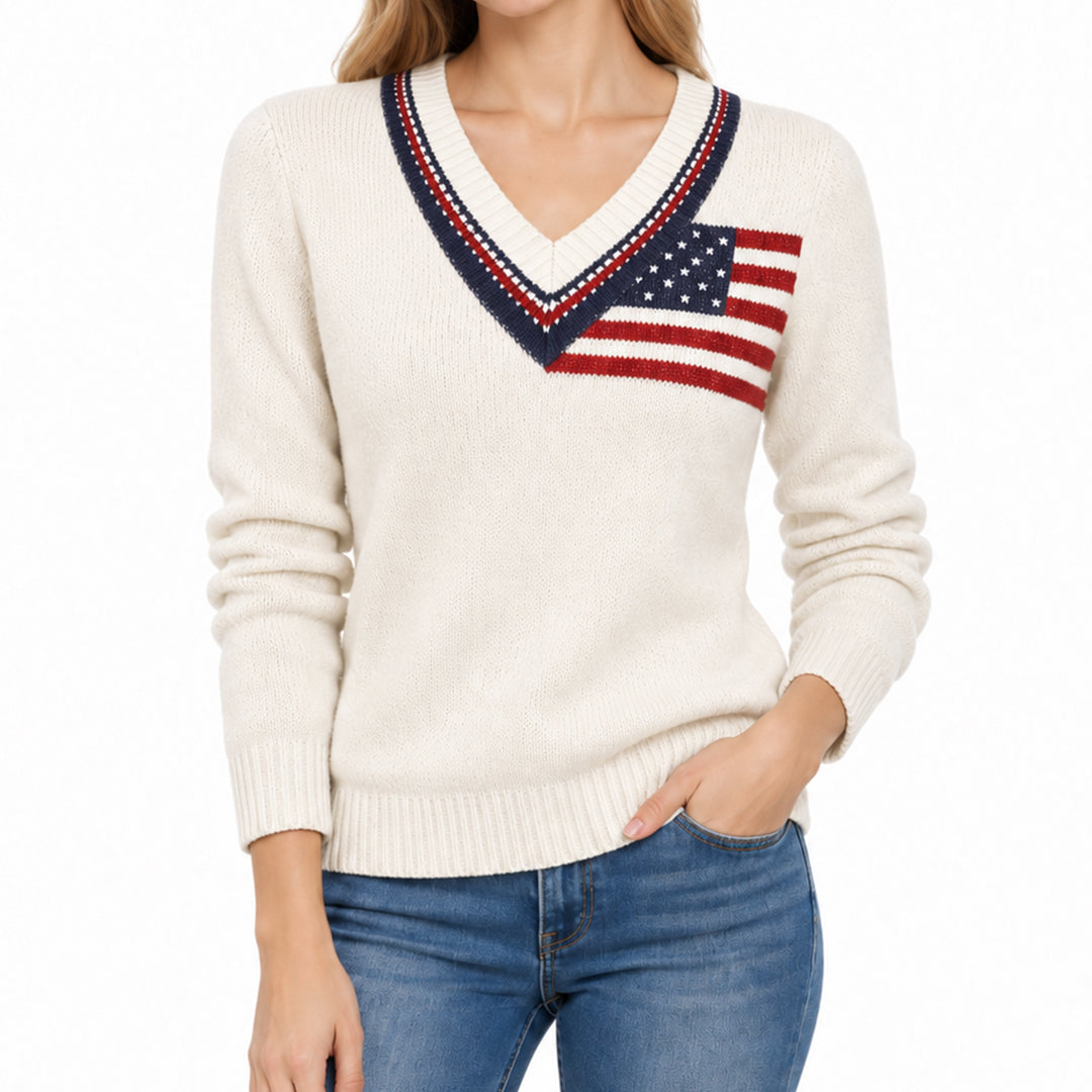 Cream V-neck knit sweater featuring a small American flag chest motif