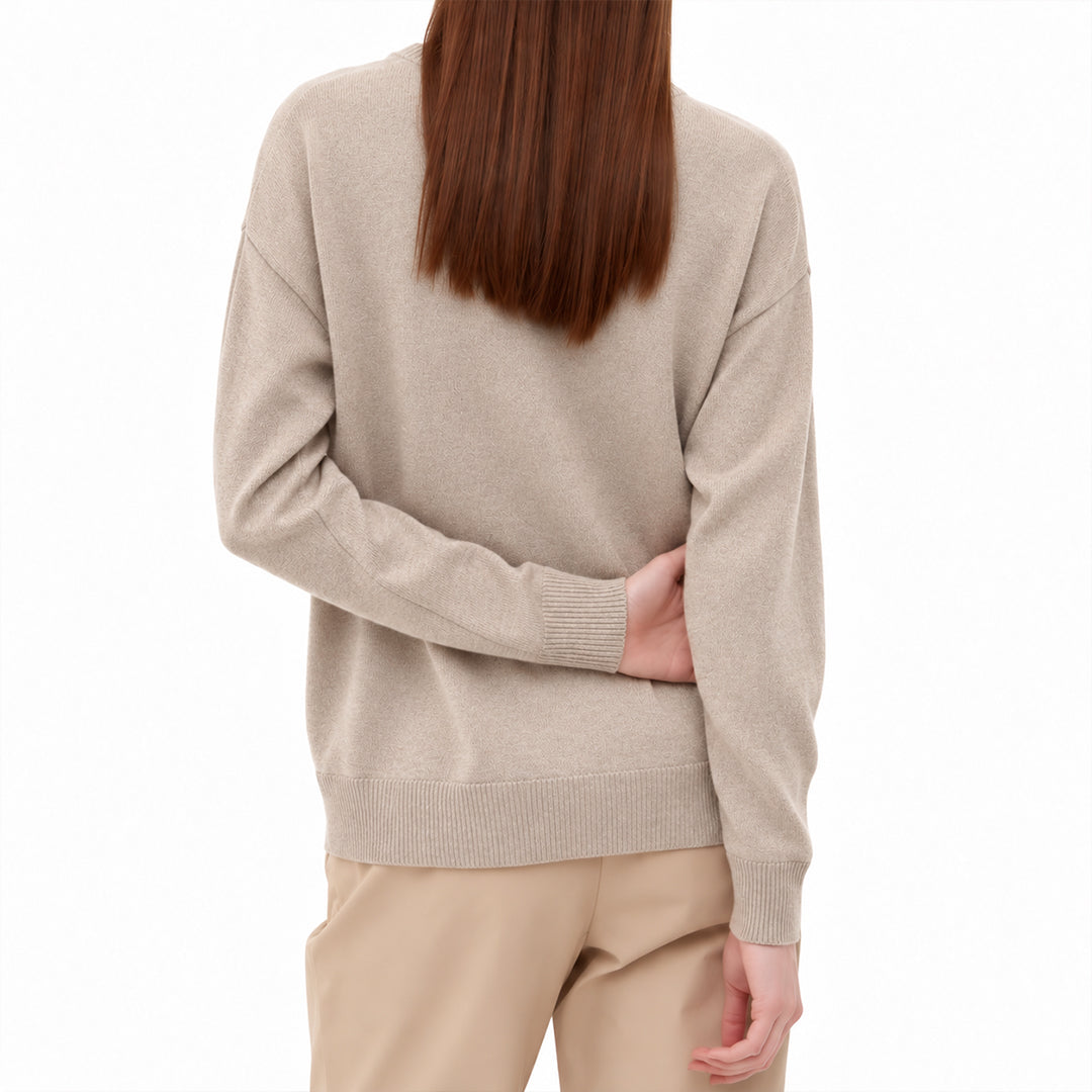 Back view of a relaxed fit women's knit sweater