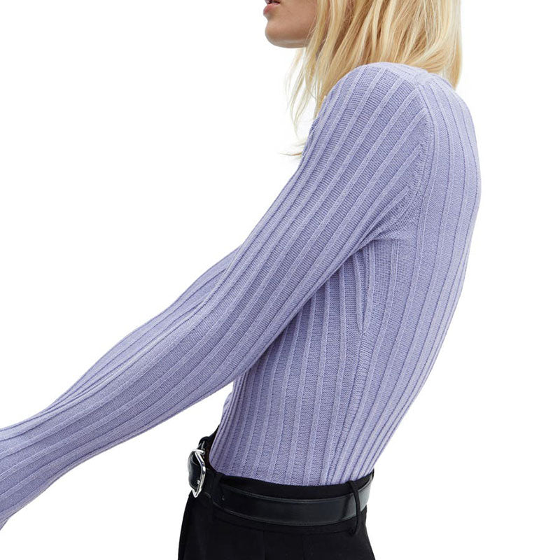 Side view of a light purple ribbed knit sweater in a fitted style, showing the textured pattern and wool blend material.