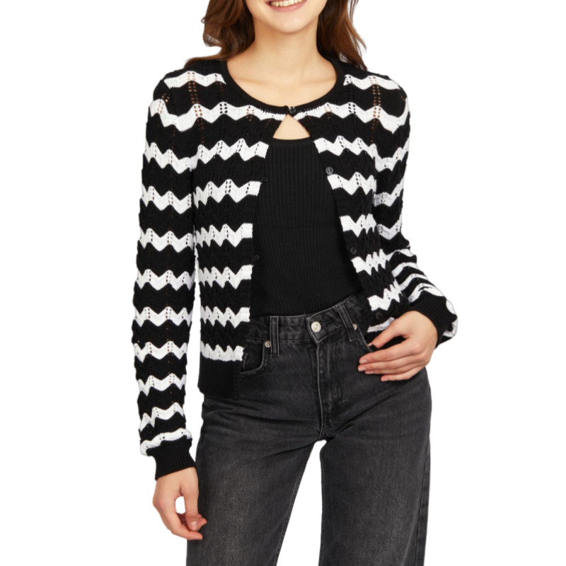 Front view of a custom black and white zigzag stripes knit cardigan, worn by a model. The cardigan is lightweight with a button closure and a stylish open front.