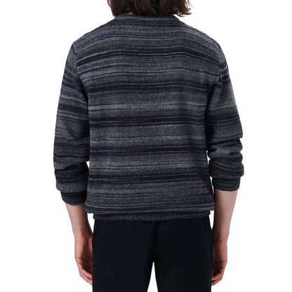 Back view of a dark wool blend striped knit sweater worn by a man, showcasing the striped design and fit.