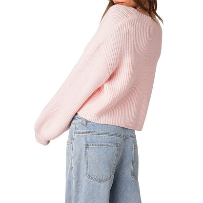 Side view of a custom pink knit cardigan with a relaxed fit and V-neck design, perfect for layering.