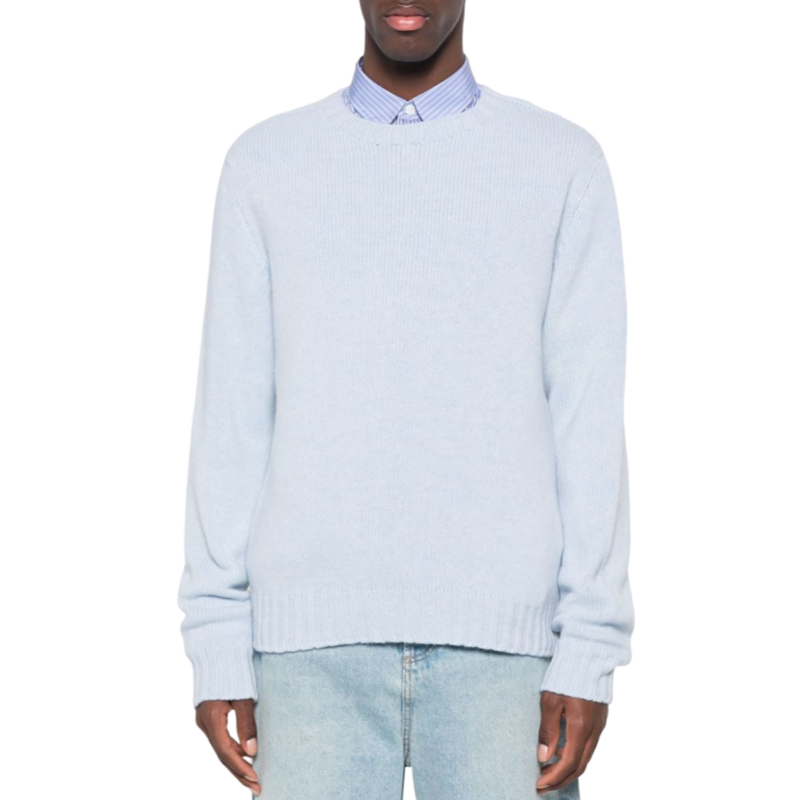 Front view of a custom light blue pullover sweater worn by a model, showcasing its simple and elegant design, perfect for OEM/ODM manufacturing.