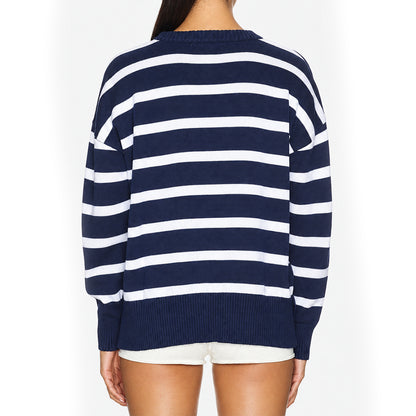 Back view of a navy and white striped women's knit sweater
